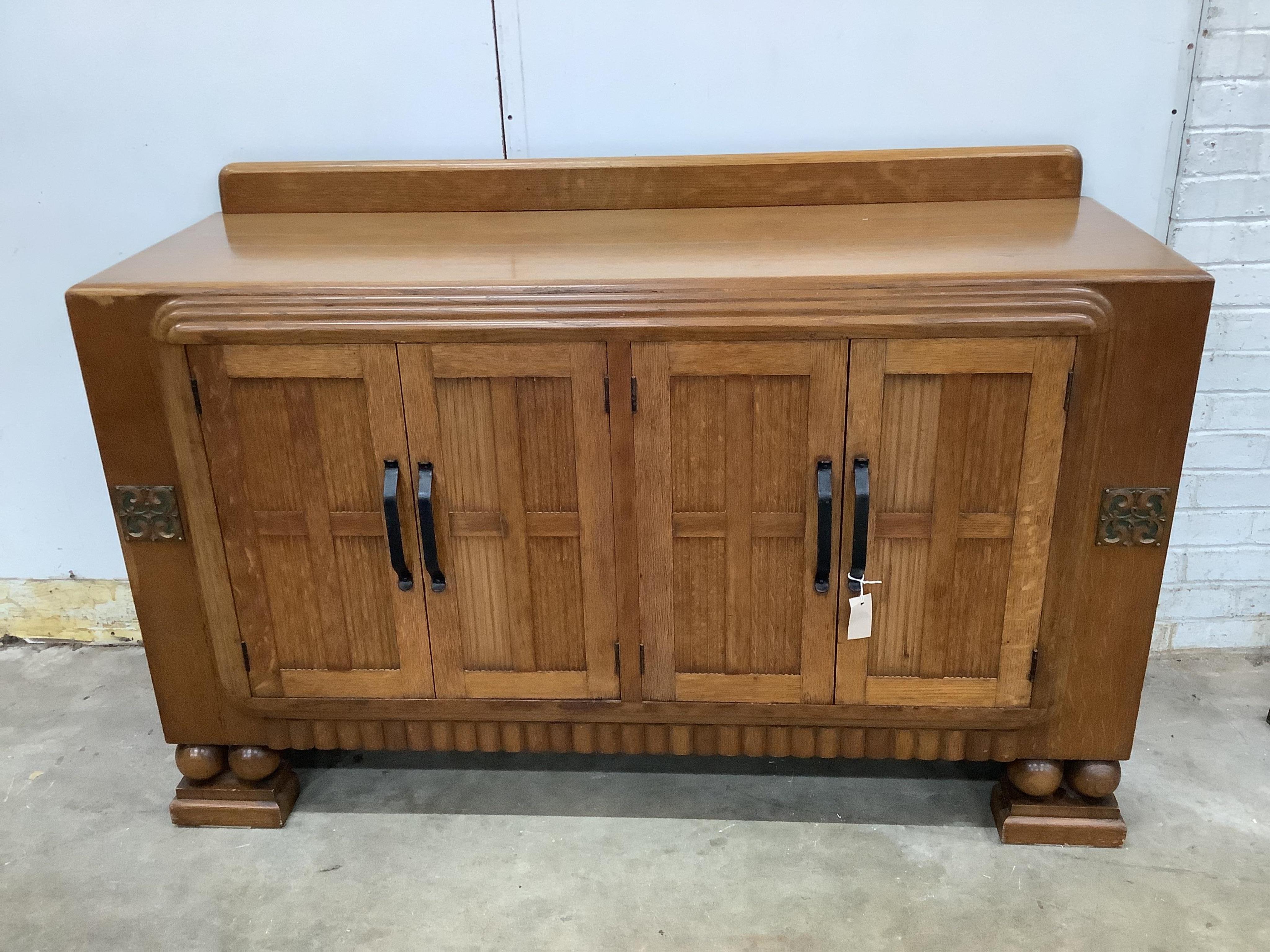 A French Art Deco oak sideboard, width 153cm, depth 52cm, height 99cm. Condition - good